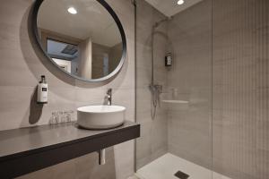 Un baño de Hotel Pombal Rooms