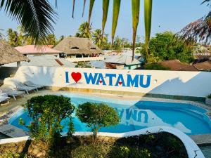 Bazén v ubytování Watamu Villaggio nebo v jeho okolí