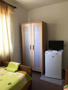 Postel nebo postele na pokoji v ubytování Vila ALBA AREAL