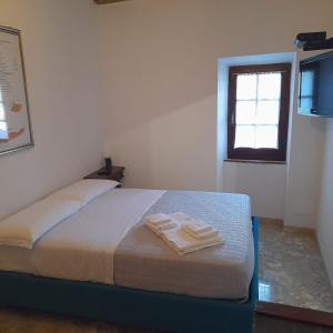 Postel nebo postele na pokoji v ubytování Casetta del Poio
