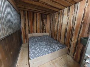 Letto o letti in una camera di Back to Basic