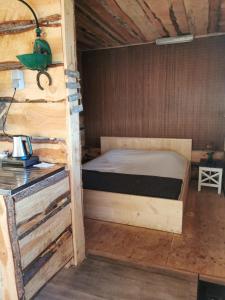 Letto o letti in una camera di Back to Basic