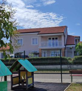 a playground in front of a house at Lavanda & limone in Koper