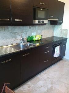 Una cocina o zona de cocina en 30C Route d'Arzier