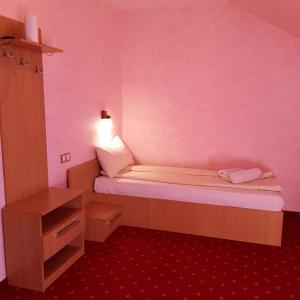 Postel nebo postele na pokoji v ubytování Motel Vector