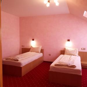 Postel nebo postele na pokoji v ubytování Motel Vector