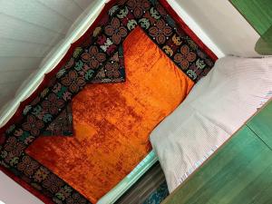 "Bilim" Guest House客房内的一张或多张床位