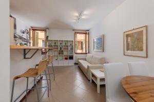 a living room with a couch and a table at Art & Culture Biennale - Venezia Sweet Stay in Venice