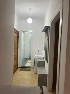 Koupelna v ubytování Learti Apartment