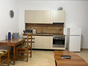 Kuchyň nebo kuchyňský kout v ubytování Learti Apartment