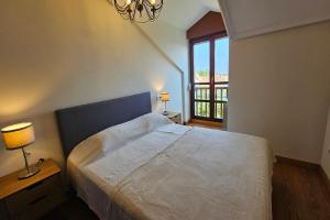 Postel nebo postele na pokoji v ubytování Apartamento El Balcón del Cuera de Llanes