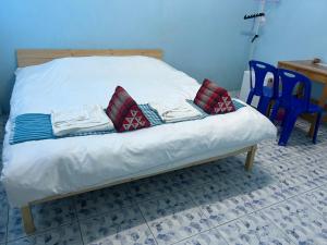 Postel nebo postele na pokoji v ubytování Noot's Guesthouse