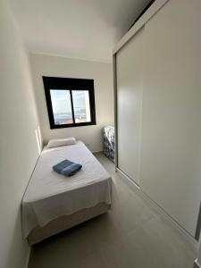 Postel nebo postele na pokoji v ubytování SP Expo Apto 4 pessoas