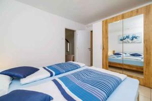 Posteľ alebo postele v izbe v ubytovaní Apartment in Crikvenica 39351