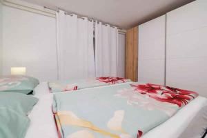 Posteľ alebo postele v izbe v ubytovaní Apartment in Crikvenica 39351