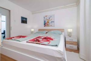 Posteľ alebo postele v izbe v ubytovaní Apartment in Crikvenica 39351