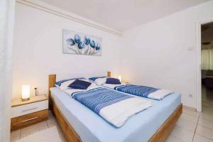 Posteľ alebo postele v izbe v ubytovaní Apartment in Crikvenica 39351