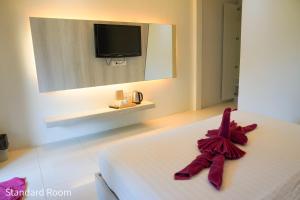 Letto o letti in una camera di Silversand Resort