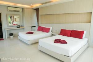 Letto o letti in una camera di Silversand Resort