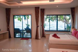 Letto o letti in una camera di Silversand Resort