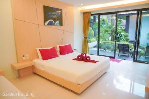 Letto o letti in una camera di Silversand Resort