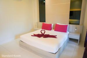 Letto o letti in una camera di Silversand Resort