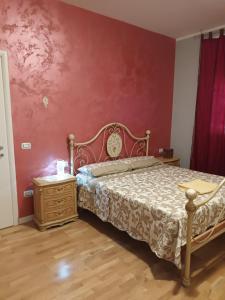 Postel nebo postele na pokoji v ubytování La Casa di Raffi