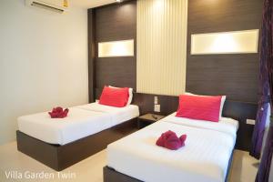 Letto o letti in una camera di Silversand Resort