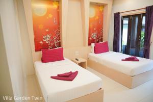 Letto o letti in una camera di Silversand Resort