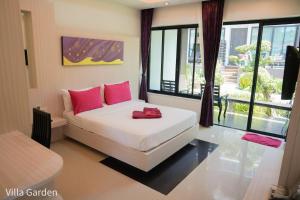 Letto o letti in una camera di Silversand Resort