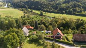 an aerial view of a farm with a house at Kuća za odmor Casa Huerta in Frketič