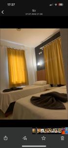 Postel nebo postele na pokoji v ubytování Kılavuz otel