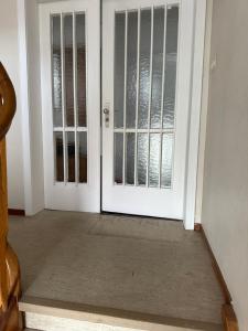an empty room with a door and a window at Comfort Apartments Heilbronn in Heilbronn +23 photos