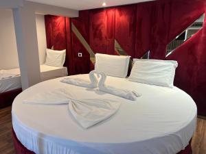 Postel nebo postele na pokoji v ubytování Hotel Alion21