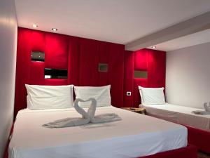 Postel nebo postele na pokoji v ubytování Hotel Alion21