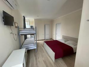 Voodi või voodid majutusasutuse Barakat Hotel toas