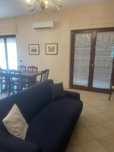 Posezení v ubytování Central Apartment