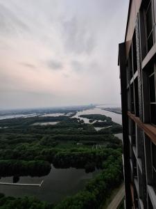 a view of a river from a building at Jakarta goldcoast seaview apartment in Jakarta