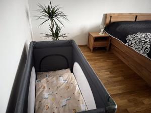 Posteľ alebo postele v izbe v ubytovaní Rezidence u Vaňkovky