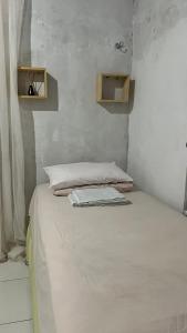 Postel nebo postele na pokoji v ubytování Hostel Renascer nos Lençóis + 14 fotografií