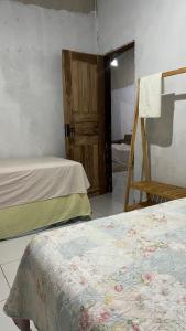 Postel nebo postele na pokoji v ubytování Hostel Renascer nos Lençóis