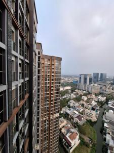 a view of a city from a building at Executive room goldcoast seaview pik in Jakarta