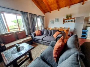 Area soggiorno di PA Sands Beach House Kowie River 9 Sleeper Pool