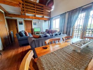 Area soggiorno di PA Sands Beach House Kowie River 9 Sleeper Pool