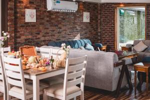 Χώρος καθιστικού στο Muzdan Holiday homes