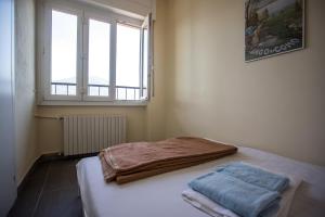 Postel nebo postele na pokoji v ubytování Lake Como Hostel
