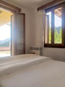 Postel nebo postele na pokoji v ubytování Pavliani country house