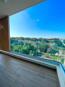A balcony or terrace at OpenView Apartment Marsaxlokk