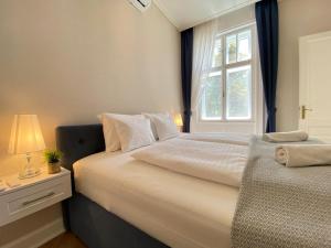 Posteľ alebo postele v izbe v ubytovaní Five Stars Experience Bestern