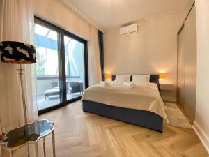 Posteľ alebo postele v izbe v ubytovaní Five Stars Experience Bestern